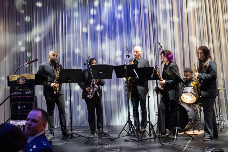 The Tampa Bay Saxophone Collective playing on stage